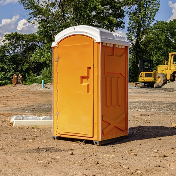 how often are the porta potties cleaned and serviced during a rental period in Nelson